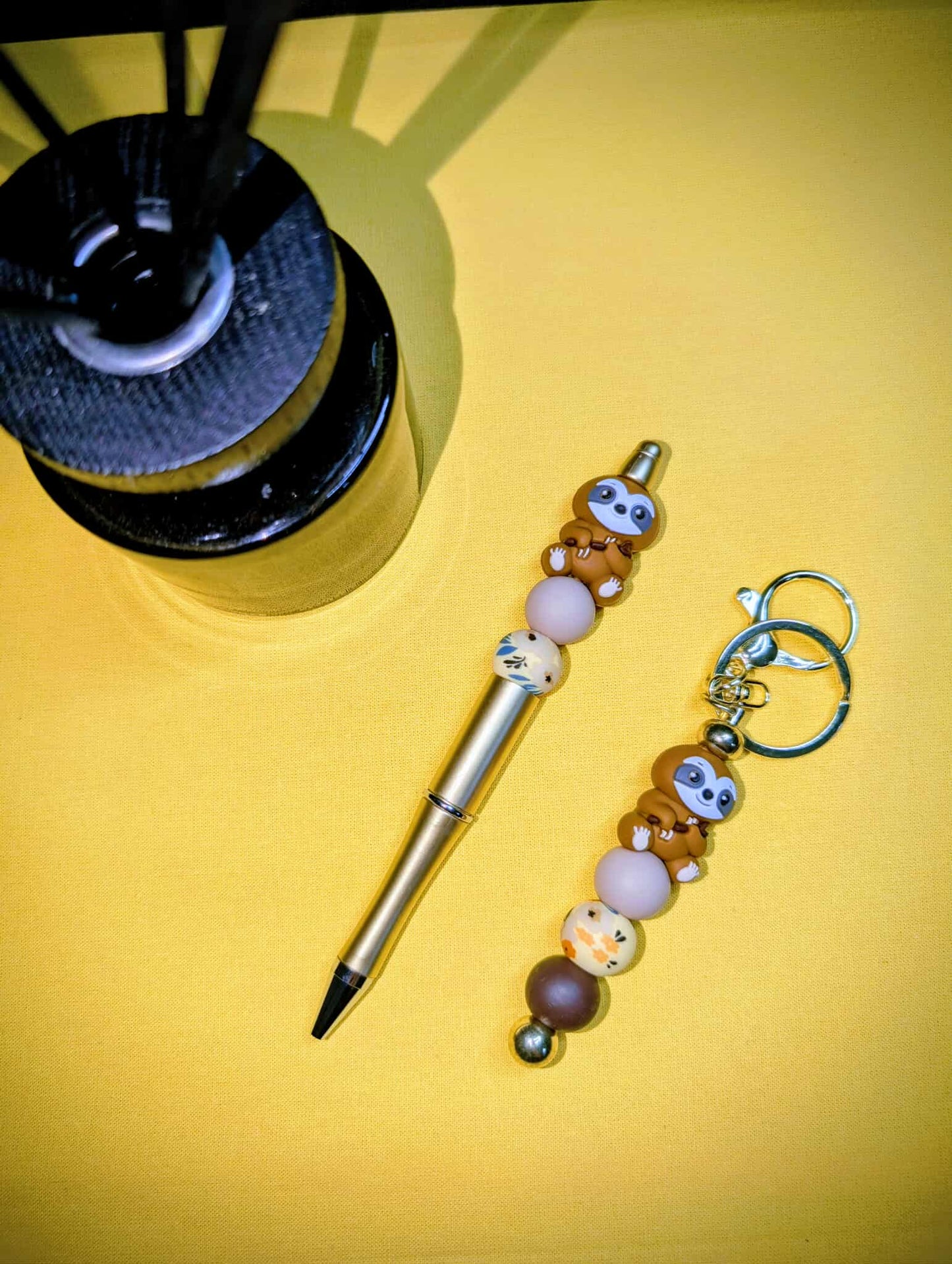 Ensemble stylo et porte-clés PARESSEUX DORÉ