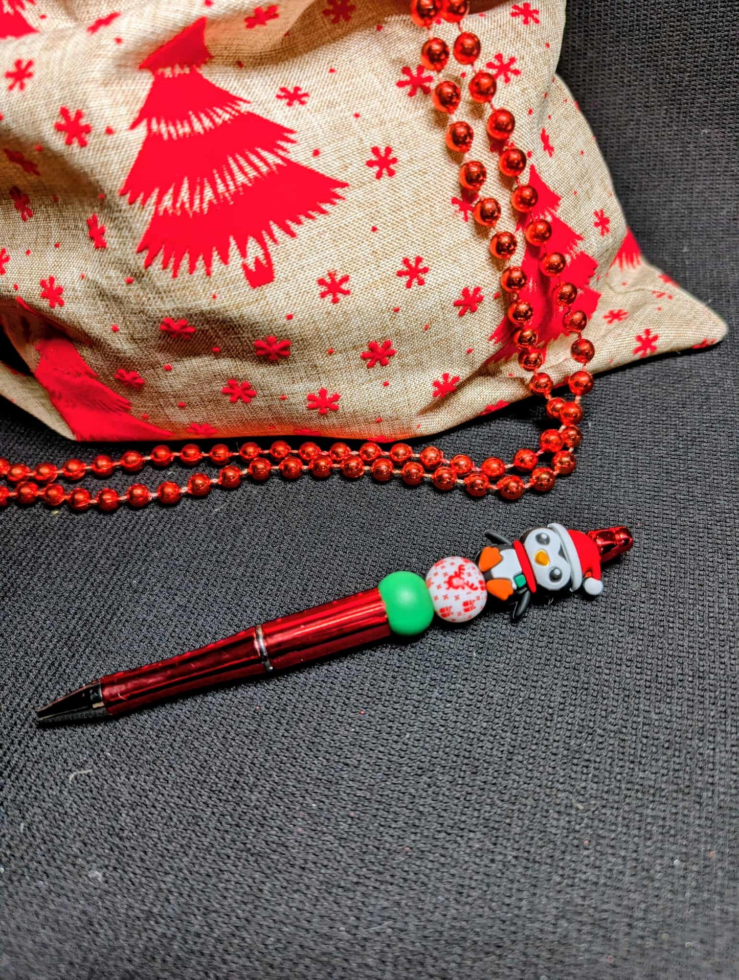 Stylo rouge PINGOUIN DE NOEL